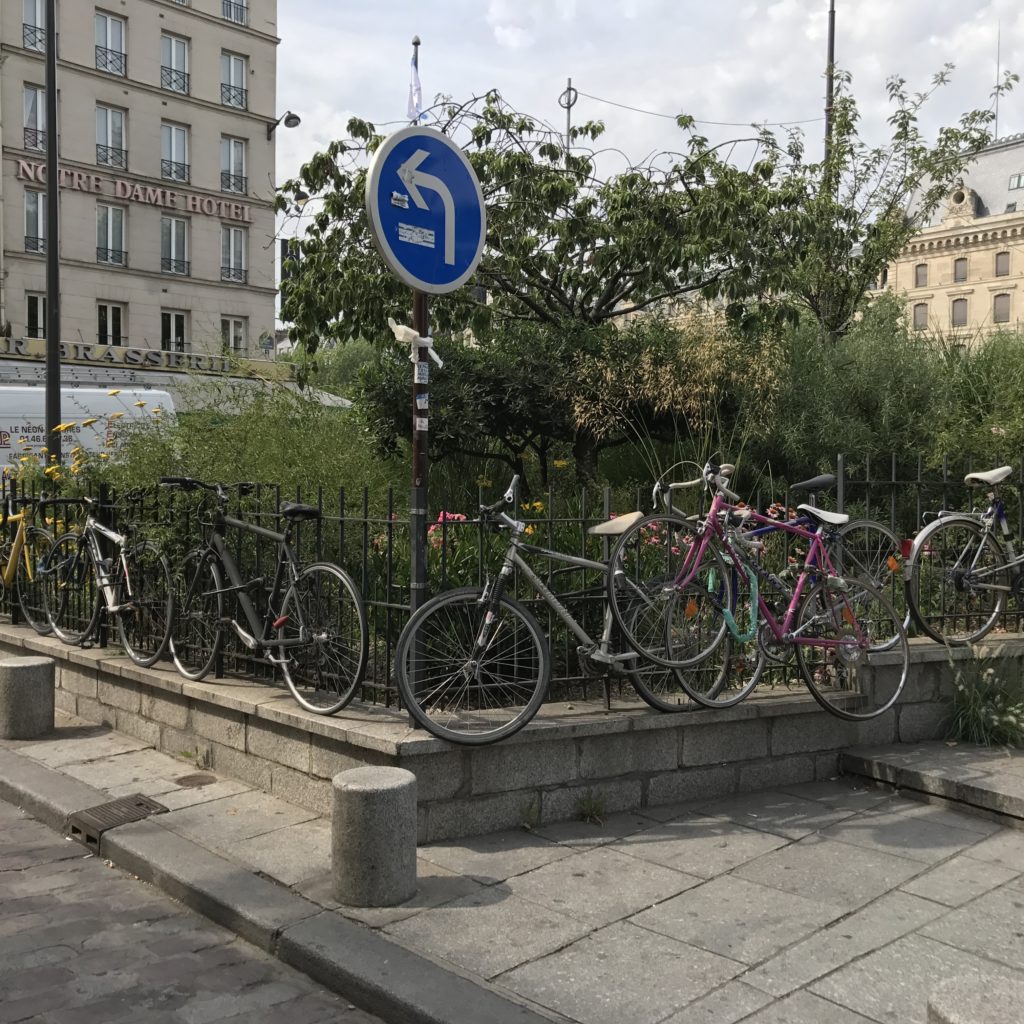 Paris bikes on fence